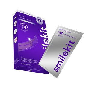 Bandes blanchissantes pour les dents Smilekit Purple, blanchiment longue durée de 30 jours avec correction de la couleur, 14 traitements pour usage domestique - Product Image 1