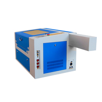 Machine de gravure et de découpe laser CNC refroidie à l'eau CO2 6040 50W 80W 100W pour acrylique, bois, papier, tissu, cuir, plastique, caoutchouc, MDF
