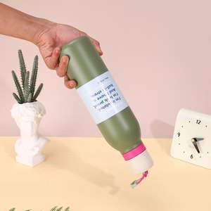 Bouteille de voyage extérieure facile à transporter avec couvercle et sangle Owalo en forme de Cola, à col étroit, en acier inoxydable à double paroi isolée sous vide - Product Image 3