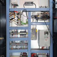 Routeur CNC 3 axes avec changeur d'outils automatique, broche de refroidissement par air 9 kW, table à vide, machine de fabrication de meubles en bois 2500 kg