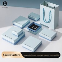 Boîte de rangement bleue pour bijoux avec couvercle, doublure en éponge, tiroir à empreintes pour emballage de boucles d'oreilles et colliers