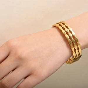 Bracelet de luxe tressé en acier inoxydable, double couche, creux, plaqué or 18 carats et argent, idéal pour un cadeau d'anniversaire - Product Image 1