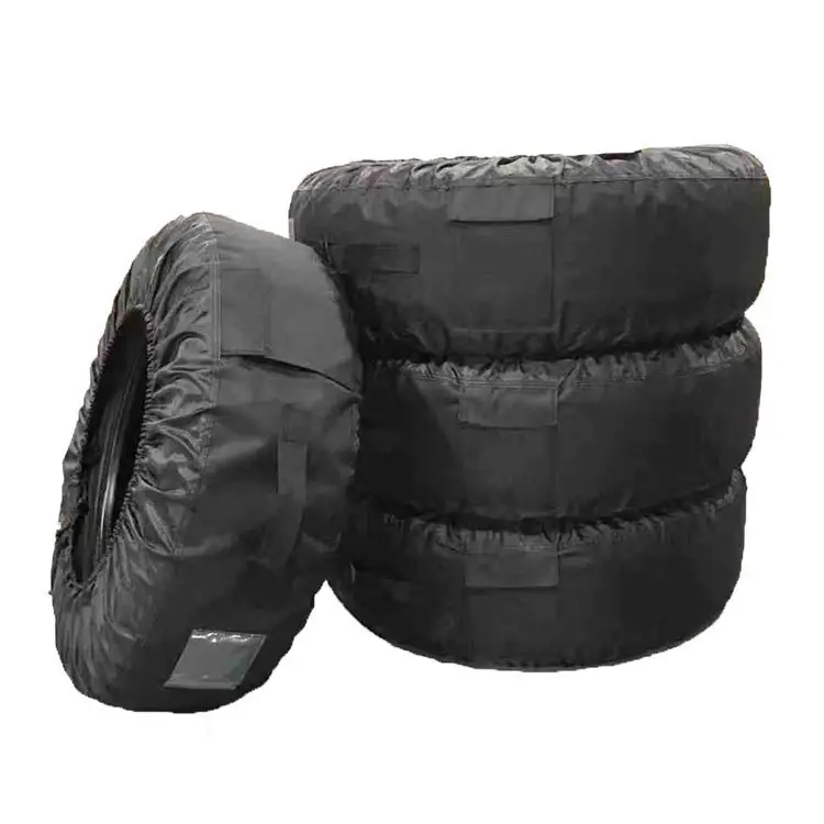 ほこりや傷に対する耐久性のある冬用ホイール収納トートハンドル付きタイヤカバー季節のスペアタイヤバッグ