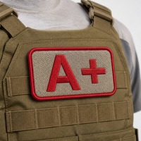 Badge brodé personnalisé A+ 3D thermocollant sur toile pour gants – Commande en gros