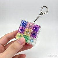 Porte-clés Fidget à 9 touches LED transparentes, clavier sensoriel, jouet anti-stress, pendentif coloré pour sac, vente en gros