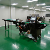 Machine d'emballage alimentaire entièrement automatique SZ-450 pour sachets de 30 à 100 unités/min, largeur de film 290-450 mm, pour snacks, chocolats et autres produits.