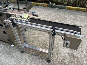 โซลูชันการติดฉลากแสตมป์ภาษีอัตโนมัติสำหรับภาชนะทรงกลมในสายการผลิต - Product Image 5