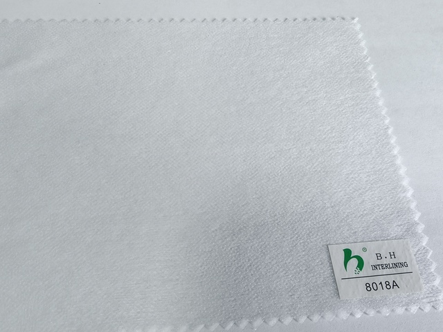 New Fiber Non Woven Fusible Interlining 23gsm 25gsm for Garment Blouse and Sportswear