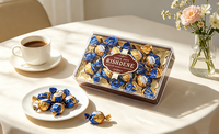 Coffret Cadeau de Chocolats Rectangulaires Transparents de Luxe, Boules de Chocolat Fourrées à la Crème, Individuellement Emballées dans du Papier d'Aluminium Bleu et Doré