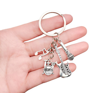 Set de Llaveros Metálicos de Instrumentos Musicales: Guitarra, Batería, Micrófono, Notas Musicales, Accesorios para Músicos, Regalos, Piano, Flauta - Product Image 1