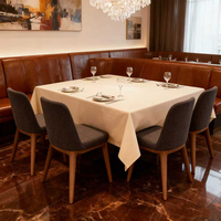 Ensemble de mobilier de restaurant de luxe léger pour café et salon de thé : chaises en tissu et bois, table et banquette
