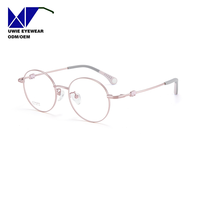 Monture de prescription ronde en titane sur mesure OEM, anti-lumière bleue, pour enfants et adolescents, taille 47-17-142, fabricant professionnel