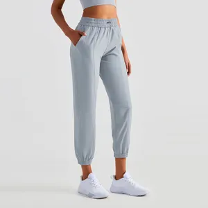 Logo personnalisé pour course à pied, séchage rapide upf50 +, sport décontracté, vêtements de rue, poches, cordon de serrage, pantalon de yoga, jogger ample pour femmes