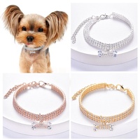 Collier Classique Hip-hop pour Animaux de Compagnie du Fabricant avec Strass et Motif Os, Chaîne pour Chiens et Chats Toutes Saisons