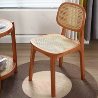 Chaise de salle à manger en rotin tressé avec pieds en bois massif et coussin, best-seller pour restaurant, hôtel et maison