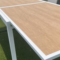 Table à manger extensible moderne pour l'extérieur avec structure en aluminium et plateau en verre céramique pour utilisation en cour