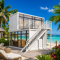 Maison conteneur préfabriquée de 20 pieds à toit en pente et murs vitrés, idéale pour les vacances en bord de mer, les gîtes Airbnb et les cabanes de station balnéaire