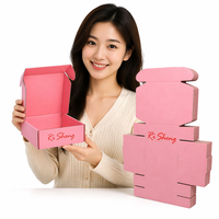 Boîte d'expédition en carton ondulé rose avec logo personnalisé imprimé pour cadeaux et vêtements