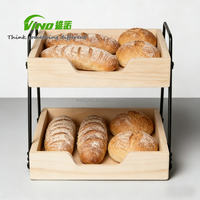 Étagère à nourriture en bois à deux niveaux avec cadre en métal pour pâtisseries et produits de boulangerie - Buffet Hôtel