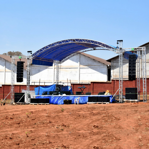 Estructura de escenario arqueada de aleación de aluminio de 12m x 10m x 6m, instalación rápida, estructura modular para festivales al aire libre, techo azul - Product Image 1