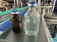 Machine de remplissage, de scellage et d'étiquetage de bouteilles en verre à prix d'usine, remplisseuse et scelleuse de bouteilles en verre avec certifications CE et ISO