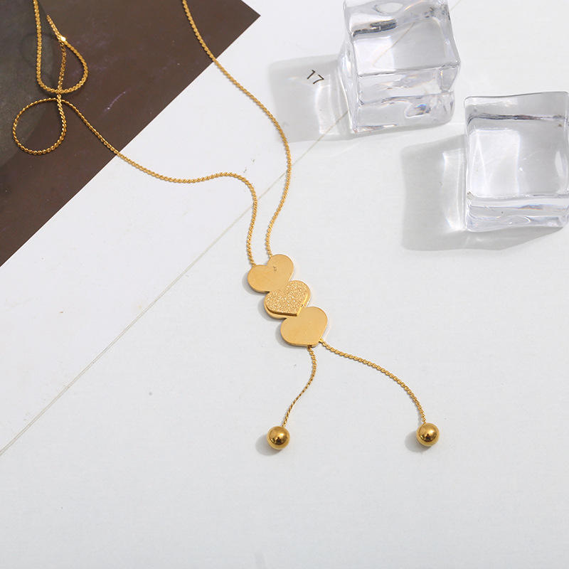 Double-layer heart-shaped steel bead tassel pendant