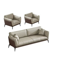 Ensemble canapé et table basse en cuir de bureau simple et moderne pour une réception d'affaires décontractée