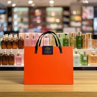 Boîte cadeau magnétique de luxe personnalisée avec poignée, emballage en papier rigide orange pour cosmétiques, parfums et cadeaux de mariage