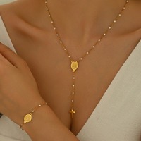 Ensemble de bijoux populaires pour filles, collier et bracelet avec pendentif mini croix délicat, chaîne à maillons en O, acier inoxydable pour un usage quotidien TGXL14717