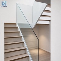 Système de garde-corps en verre sans cadre LANGE, design minimaliste et esthétique, avec canal dissimulé pour résidence