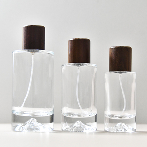 Luxury 30ml Cylinder Round Wooden Cap <strong>Purfum</strong> Spray <strong>Bottle</strong> 50ml 100ml Empty Glass Perfume <strong>Bottle</strong> with Wooden Cap - Product Image 3
