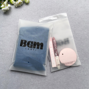 Customized Logo Printed Frosted <b>Plastic</b> Bag Women Jeans <b>Packaging</b> Self Sealing Tape Garment Bag for Small Business - Product Image 1