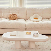 Table basse moderne en bois d'ingénierie blanc en forme de nuage, au design tendance pour salons, salles à manger et espaces extérieurs
