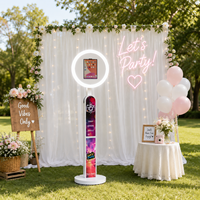 Photomaton vertical professionnel pour iPad avec anneau lumineux et écran LCD personnalisable, idéal pour mariages, fêtes et événements, disponible à la location