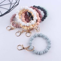 Vente en gros usine Nouveau Bracelet à perles rondes en gel de silicone de qualité alimentaire, Porte-clés pendentif anti-perte