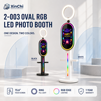 Photomaton gonflable ovale de 10,9 pouces avec écran tactile et valise de transport pour les fêtes, les mariages et les événements (compatible avec les appareils photo)