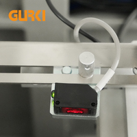 Machine d'emballage sous film rétractable électrique automatique GURKI pour boîtes à pizza, emballage alimentaire, garantie 1 an, excellente qualité