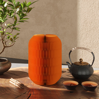 Solutions innovantes d'économie d'espace pour meubles en nid d'abeille et service de thé de lanternes en papier magnétiques pour des décorations de fête à la maison élégantes