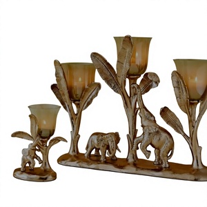 Portavelas de cristal decorativo con diseño de elefante esculpido y hoja de plátano, para decoración de mesa. - Product Image 1
