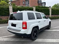 Jeep Patriot d'occasion 2013 2.4L 4x4 Édition Sport SUV Compact Noir 5 Places Personnalisation Intérieure Disponible