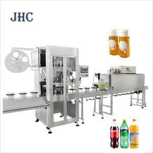 Machine automatique de pose d'étiquettes et de rétraction de manchons en PVC à moteur électrique pour bouteilles - Product Image 1