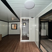 Maison conteneur préfabriquée à structure plate de 20 pieds et 40 pieds, avec 2 chambres, pour usage résidentiel, villa, centre commercial et école