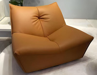 Fauteuil de sol moderne en similicuir PU sans accoudoirs, rembourré en éponge douce, pivotant, résistant à l'eau et facile d'entretien pour salon et chambre à coucher
