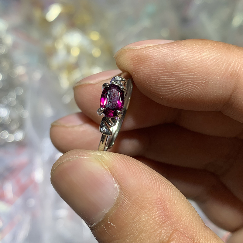 Purple tooth black garnet