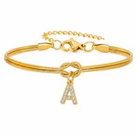 Bracelet en acier inoxydable ajustable couleur or et argent, chaîne serpent, design nœud d'amour, avec breloque lettre initiale 26 en zircon