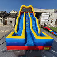 Château gonflable Yuedong avec toboggan sec incurvé double piste, parc de jeux amusant, vague arc-en-ciel