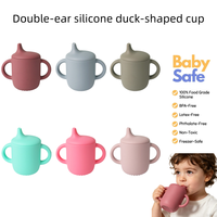 Gobelet d'apprentissage en silicone double-oreille en forme de canard, personnalisable, de qualité alimentaire, mignon, pour bébés et enfants, avec paille, vente en gros