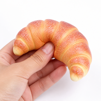 Jouet Squishy en forme de Croissant, à remontée lente, avec couches feuilletées courbées et motif orange, anti-stress, à presser et à revenir à sa forme d'origine, compagnon de bureau
