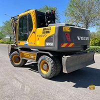 Excavatrice sur roues hydraulique mobile VOLVO EW145B d'occasion de 14 tonnes avec boîte de vitesses et pompe PLC, matériel de construction