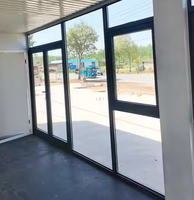 Maison modulaire préfabriquée en acier de luxe moderne de 20 pieds avec mur en verre pliable pour supermarché, centre commercial, hôtel, complexe hôtelier